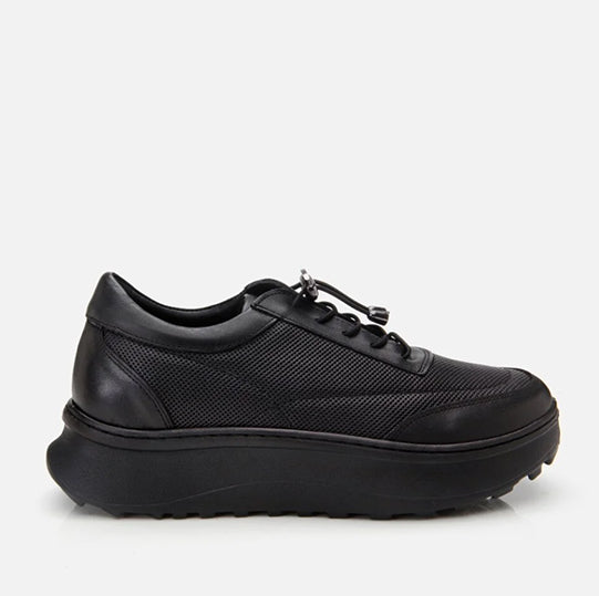 A black sneaker with a thick sole and lace-up closure.